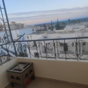 a balcony with a view of the beach at Hurghada Sea View Apartment in Hurghada