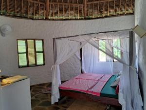 Postel nebo postele na pokoji v ubytování Diani Yoga Barn + 27 fotografií