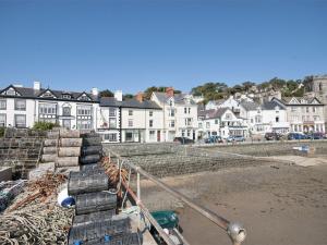 a group of stairs with houses in the background at 2 Bed in Aberdovey DY004 in Aberdyfi