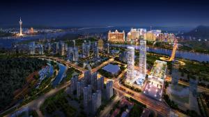 una vista aérea de una gran ciudad por la noche en Artyzen Habitat Hengqin Zhuhai en Zhuhai