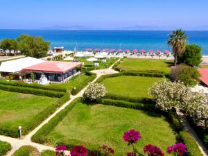 an aerial view of a park with umbrellas and the ocean at Bayside Hotel Katsaras in Kremasti