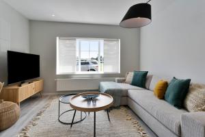 Una televisión o centro de entretenimiento en Het Zwinhuis - Spacious and comfortable family home near 't Zwin
