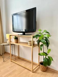 A television and/or entertainment centre at Apartment Caroline - Old Town