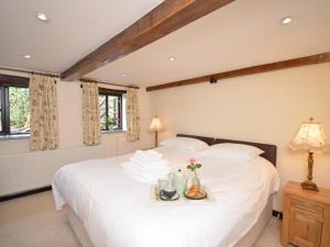 A bed or beds in a room at 2 Bed in Exmoor 83062