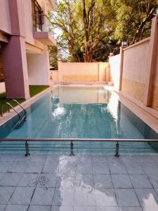 a swimming pool in the middle of a building at Voyager 002 in Nairobi