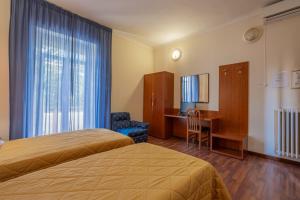 Postel nebo postele na pokoji v ubytování Hotel Monte Verde + 24 fotografií