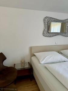 Postelja oz. postelje v sobi nastanitve Boutique Hotel Oase