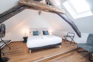 Posteľ alebo postele v izbe v ubytovaní La maison Renaissance - Gîte 8prs