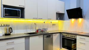 Kuchyňa alebo kuchynka v ubytovaní V6 Apartment by Small Home Budapest