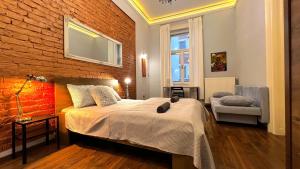 Posteľ alebo postele v izbe v ubytovaní V6 Apartment by Small Home Budapest