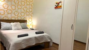 Posteľ alebo postele v izbe v ubytovaní V6 Apartment by Small Home Budapest