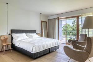 Boutique-Hotel Ballguthof am Golfplatz客房内的一张或多张床位