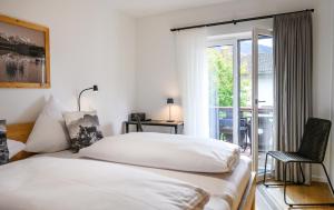 Una cama o camas en una habitación de Chalet Alpenflair II