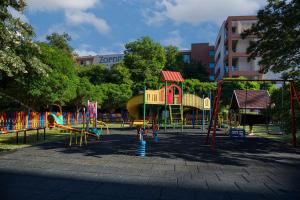 a park with a playground with a slide at MPM Hotel Zornitza Sands in Elenite
