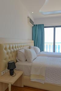 Hotel Iliria客房内的一张或多张床位