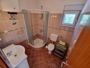Kúpeľňa v ubytovaní Apartments CHIARA