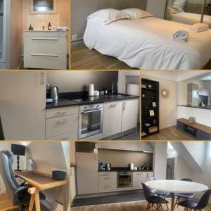 a kitchen and a bedroom with a bed and a table at La Bretonnerie *T2* in Orléans