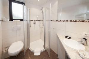Koupelna v ubytování Hotel Vergissmeinnicht