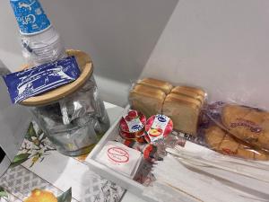 a box of food and a bottle of water at B&B LA CHICCA in Bari