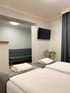Posteľ alebo postele v izbe v ubytovaní Garbarska 22 Aparthotel