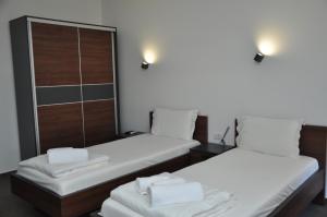 Voodi või voodid majutusasutuse Nego apartmani toas