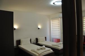 Voodi või voodid majutusasutuse Nego apartmani toas