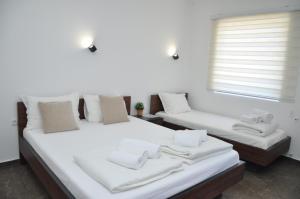 Voodi või voodid majutusasutuse Nego apartmani toas