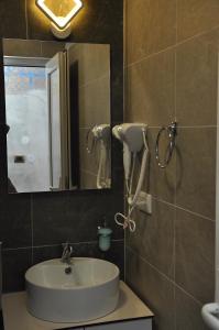 Vannituba majutusasutuses Nego apartmani