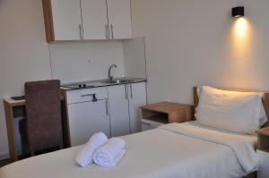 Voodi või voodid majutusasutuse Nego apartmani toas