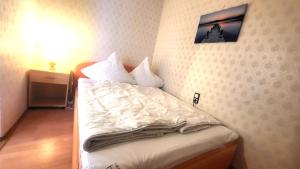 Postel nebo postele na pokoji v ubytování Ferienwohnung Feenwelt Hahnenklee Familienfreundlich