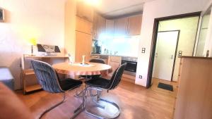 Kuchyň nebo kuchyňský kout v ubytování Ferienwohnung Feenwelt Hahnenklee Familienfreundlich + 20 fotografií