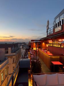 a view of a rooftop bar at dusk at RUZ Hotels in Istanbul