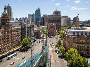 an aerial view of a city with a street at Mercure Sydney in Sydney