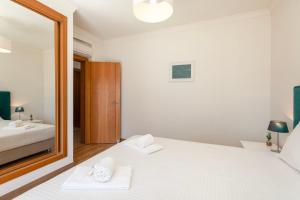 Postel nebo postele na pokoji v ubytování TAC - Pêra Gardens Villa + 23 fotografií