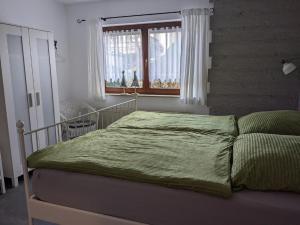 Katil atau katil-katil dalam bilik di Das kleine Försterhaus