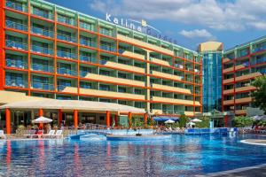 a hotel with a swimming pool in front of a building at MPM Hotel Kalina Garden - All Inclusive in Sunny Beach