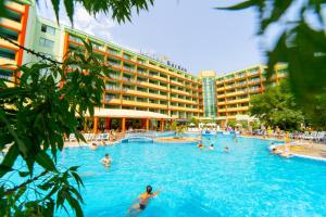 a group of people in a swimming pool in a hotel at MPM Hotel Kalina Garden - All Inclusive in Sunny Beach