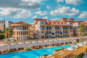 a view of the resort with a swimming pool at TUl BLUE Xanthe - Ultra All Inclusive in Side
