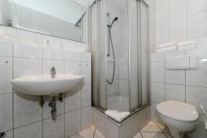 Koupelna v ubytování Kurhaus Hotel