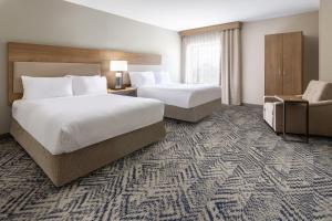 Кровать или кровати в номере Candlewood Suites - Atlanta - Kennesaw by IHG