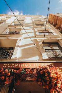 a building with a sign on the side of it at Nexthouse Pera Hotel in Istanbul