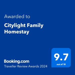 a blue screen with the text awarded to eligibility family homaway at Citylight Family Homestay in Mysore