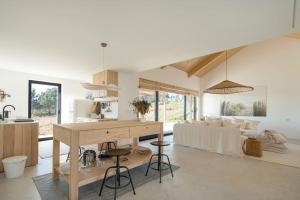 Kuchyň nebo kuchyňský kout v ubytování itacahomes casa NORO