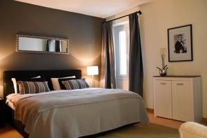 Postel nebo postele na pokoji v ubytování Boutique-Hotel Antica Posta