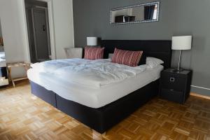Postel nebo postele na pokoji v ubytování Boutique-Hotel Antica Posta