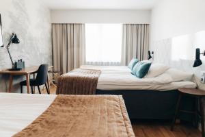 Voodi või voodid majutusasutuse Quality Hotel Ekoxen toas