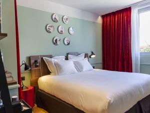 Letto o letti in una camera di Urban Hive Milano