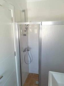 Ένα μπάνιο στο Apartments near the beach