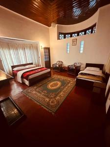 Postel nebo postele na pokoji v ubytování Princess Bungalows
