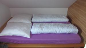 Postel nebo postele na pokoji v ubytování Ferienwohnung Am Fenn